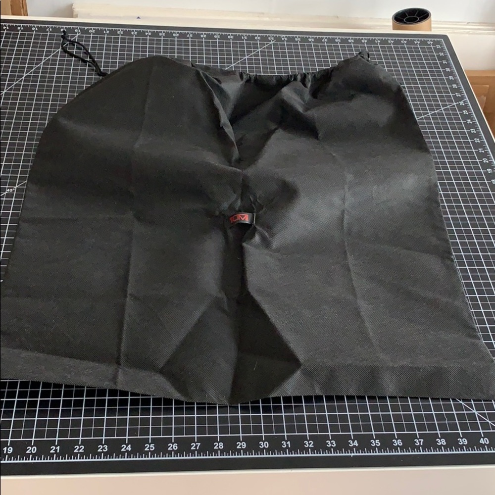 Tumi brand drawstring bag